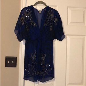 Cache sheer embellished top